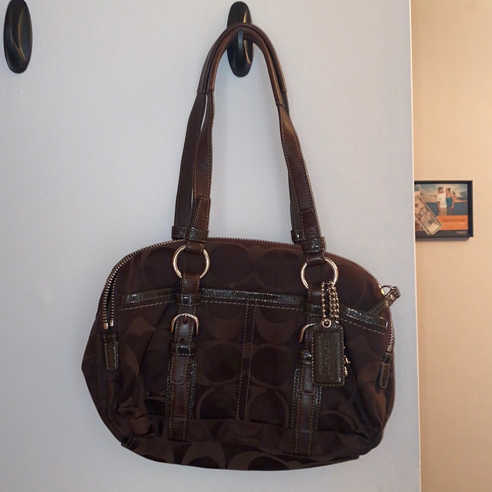 Brown Coach signature Soho satchel handbag
